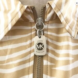 Zebra/Tiger Print zip-front Michael Kors blouse. Adjustable Sleeve Length